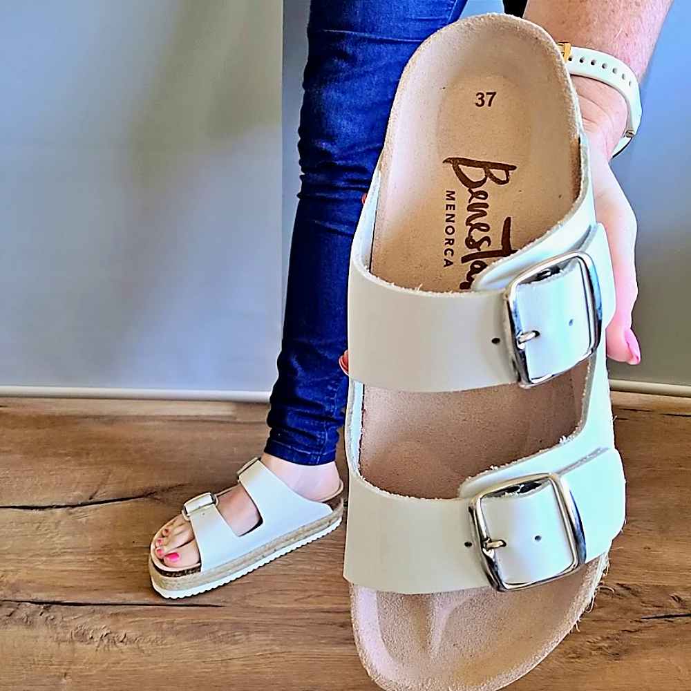 wearing-and-holding-white-greco