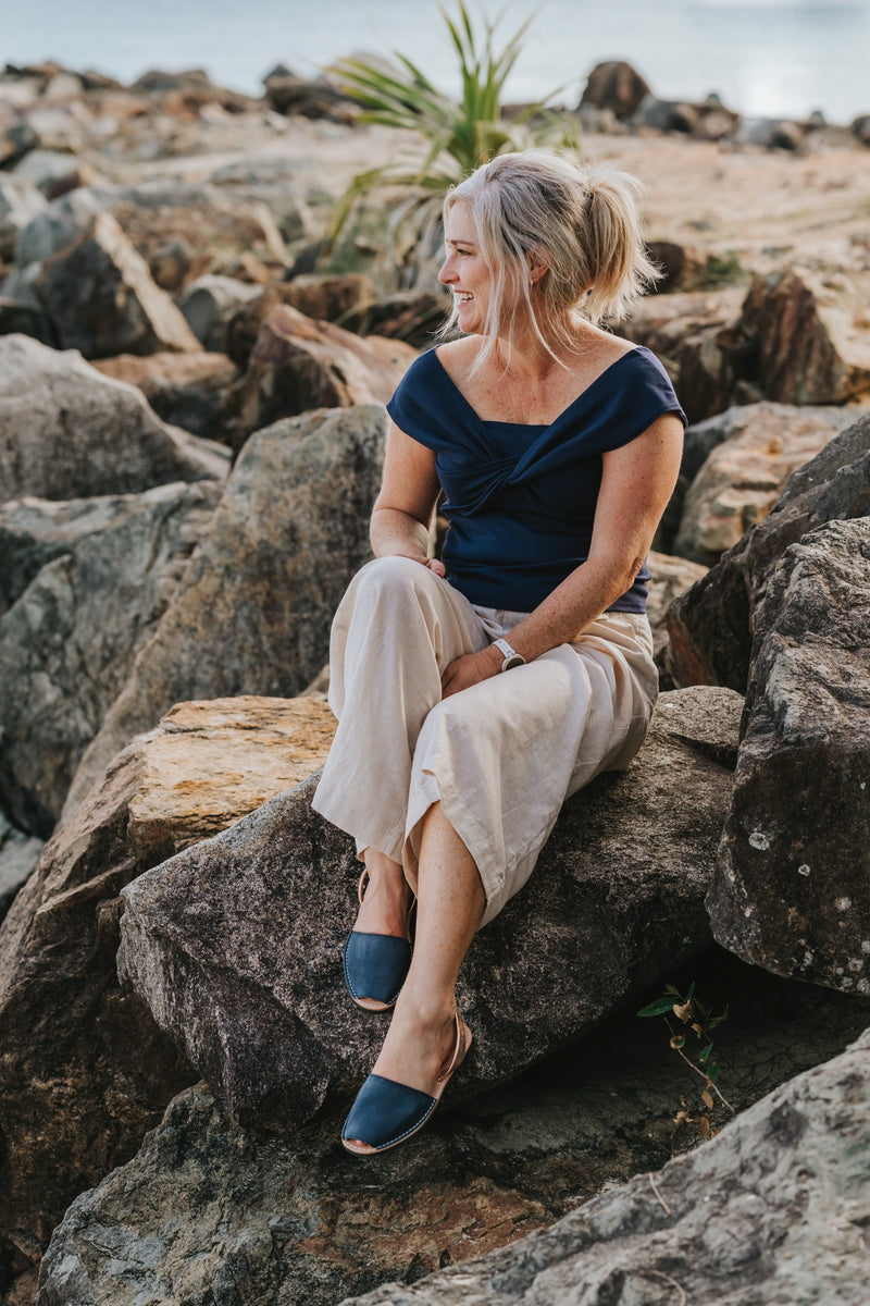 wearing navy avarcas