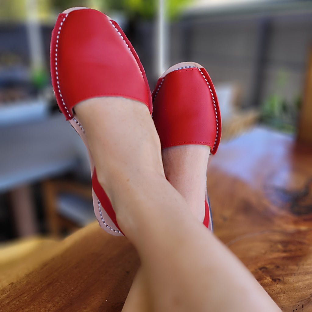 Avarca-sandals-red-napa-wearing-crossed-legs