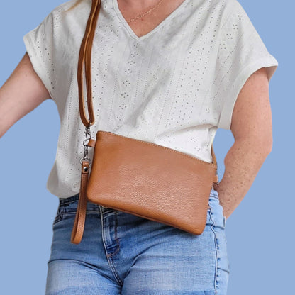 Wearing-Tan-crossbody-bag